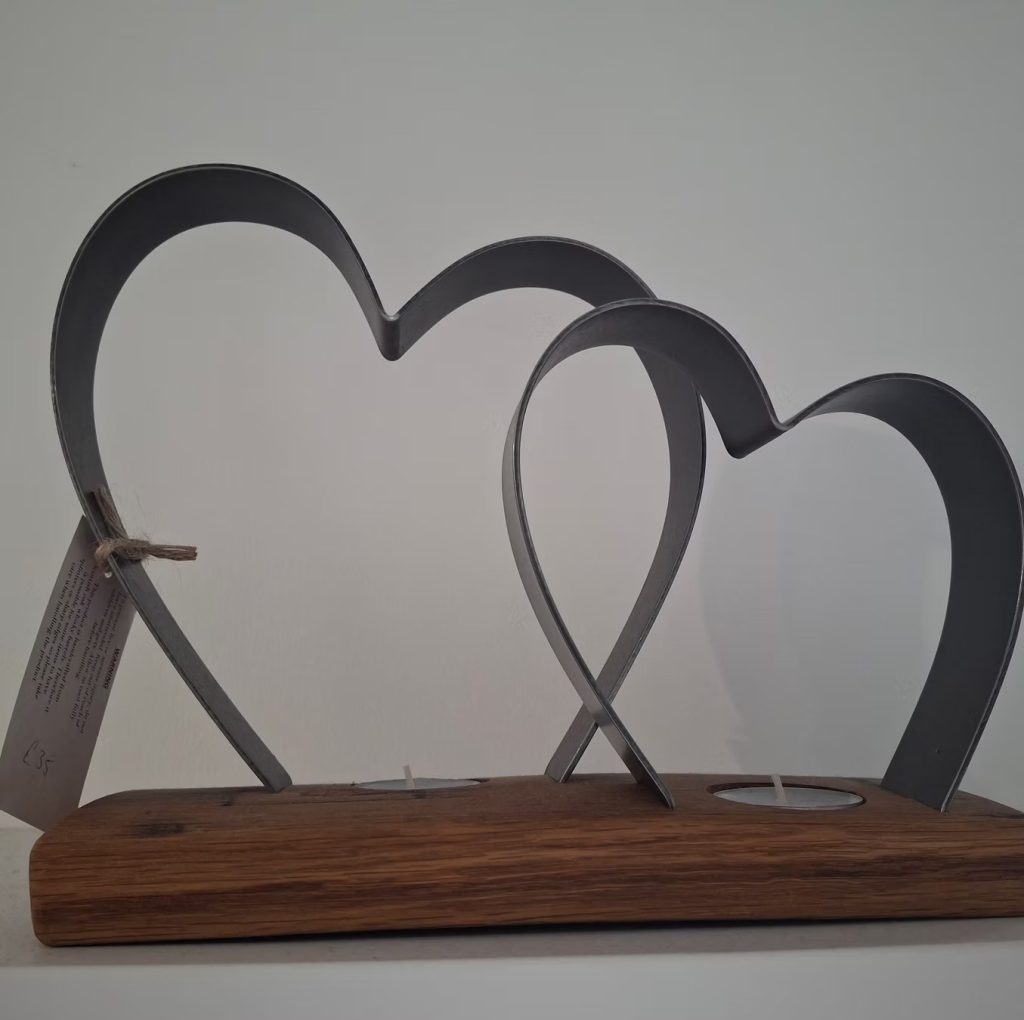 Metal heart-shaped candle holder